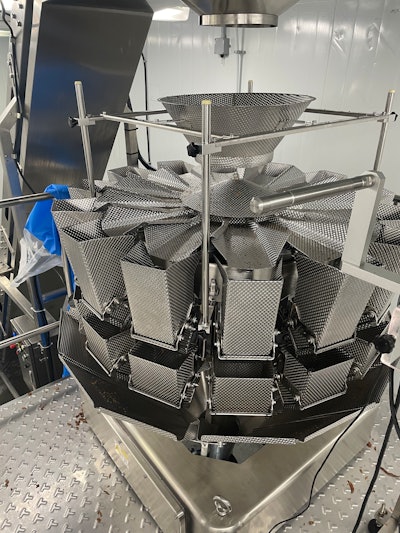 Weighing the product demands precision and used to require 14 workers. Now, the Rotobagger has taken that number down to four.