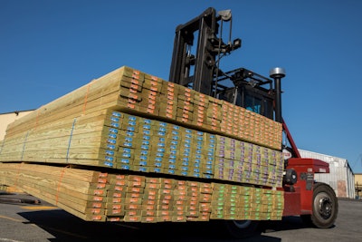 End tags for Culpeper’s pressure-treated lumber, which are stapled to the end of the product, use a solid-color background to differentiate type.