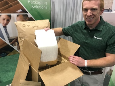 Veritiv's Kip Thompson demonstrates the starch-based panels used to maintain the cold chain for food in e-comm, such as meal kits.