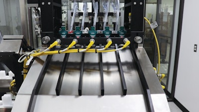 Five finished packs counted by the machine’s sensors.