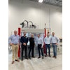 Celebrating the first Factory Acceptance Test is, from left to right: Ryan Schumacher, SOMIC Packaging’s East coast sales manager; Jason Unanue, project manager and Disney Arrubla, Engineering Director for GOYA Foods; SOMIC Packaging CEO Peter Fox; Lukas Ruhland, SOMIC’s Installations manager; and Benedikt Englbrechtinger, SOMIC’s Manufacturing Ramp-Up manager.