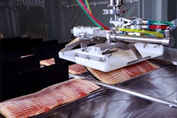 The Harrier Bacon Draft Loading System from JLS Automation loads drafts of bacon into thermoform packaging.