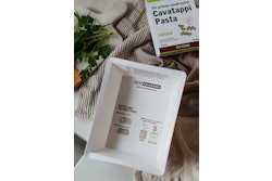 The PaperSeal tray is constructed of FSC-certified fibers and is made from a flat, precut paperboard formed on a G. Mondini machine that also applies a thin barrier-film layer in one step.