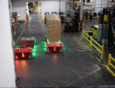 The lidar-based IAV travels on a preprogrammed path through the facility, carrying pallets from the packaging line to the warehouse.