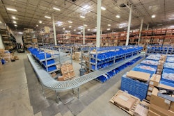 The updated layout in this fulfillment center keeps gravity fed cases moving smoothly through picking station, around elbows, and down to taping and palletizing.