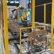 Yeaman Machine's new top-load case packer with robotic infeed and case erecting.
