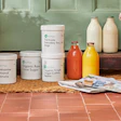 Milk & More refillable grocery packaging.