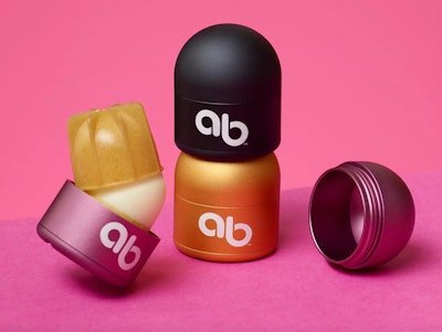 A refillable/reusable lip-balm packaging system from above & beyond includes a metallic, dome-shaped case and product refills packaged in bio-based material.