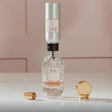 A clever dispensing applicator on the aluminum bottle refills for O.U.i.’s eaux de parfum product ensures product is transferred to the reusable glass package cleanly and easily, without product waste.