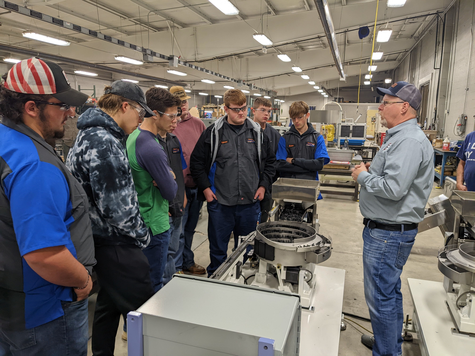 Chris Schombert, executive VP of Hoosier Feeder Company, speaking to New Castle Career Center students.