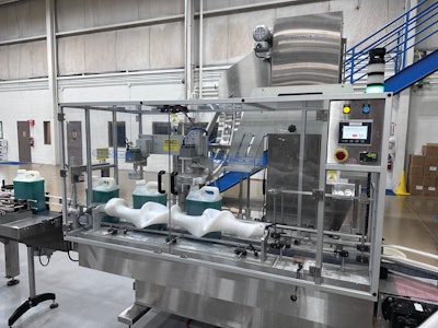 Filled bottles are conveyed to a front-gated, custom designed timing screw, where one-by-one they are accelerated and metered out until they reach a stationary pocket on the screw and a chuck-style screw capper pushes a cap onto the bottle. Capping torque must be precise to accommodate an inner cap foil seal that will be infrared sealed to the bottle downstream.