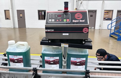 As the capped bottles pass underneath this equipment, an infrared sealing system sufficiently heats the precisely positioned foil lid that rests on the lip of the bottle, underneath the cap, so that the foil and bottle adhere to one another.