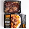 This photo shows the larger tray, which holds four servings, filled and packed on the same line.