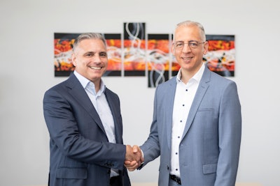 Managing Director Roland Schreiner (right) welcomes Brian Zumbolo as the new President of Schreiner Group LP in the USA.