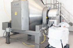 The factory-refurbished 700-TS-90-SS Rotary Batch Mixer inside Phoenix Custom's facility.