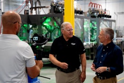 Tom Costello (right), Economics Reporter for NBC News, interviewed Dale Andersen (center), president and CEO of Delkor Systems.