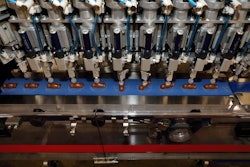 Carousel Feeding System For Flat Based Chocolate Pralines