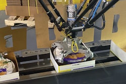 For twin-pack cartons, the delta style robot picks bagged pans from the conveyor belt in the foreground, rotates them so that the ponytail is in the 12 o’clock position, and places them into a carton that is erected from a flat blank upstream.