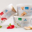 Yaza's labneh packaged in 12 oz tubs of Greiner Packaging’s K3 sustainable cardboard-plastic cups.