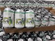 Lazy Magnolia's own brand canned beers currently use pressure-sensitive labels, but the brewery plans to switch to printed cans as soon as volume justifies the move.