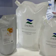 Spouted standard (multilayer) and monomaterial refill pouches are available printed, or brands can employ p-s labels (left) to lower the MOQ. 1-L, 500-mL, and 250-mL sizes are available.