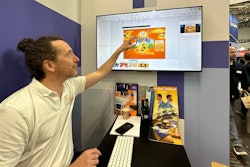 Dalim's Flaurent Epaud demonstrates Dalim ES Fusion platform at drupa, with an example of a chip bag from Swiss brand Zweifel potato chips.