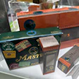 An example of mass customization and personalization using digital embellishment. Last year's player-specific ball cartons to the left, the larger 2024 cartons to the right and center.