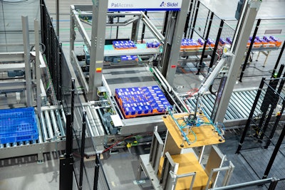 To palletize cases and single bags of product, British Sugar installed seven PalAccess automatic layer-by-layer modular palletizers.