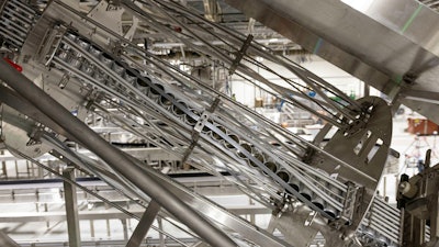 A twist rinser cleans the cans prior to filling.