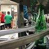 Returnable bottles of Sun Drop stay snugly on track with Multi-Conveyor’s tabletop system.