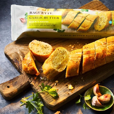 Marks & Spencer's new paper packaging for garlic baguettes is expected to eliminate about 5.5 million units of plastic packaging per year.