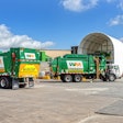 Haulers feed the tipping floor at WM's new Houston West Side material recovery facility (MRF).