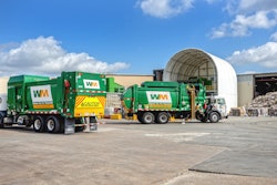Haulers feed the tipping floor at WM's new Houston West Side material recovery facility (MRF).