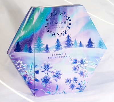 The exterior of the Lumene 2024 Nordic Beauty Secrets Advent Calendar captures the beauty of the northern landscape, while the 3D embossing on the calendar’s surface adds a tactile feel to the frozen flower illustrations. Photo courtesy of Metsä Board.