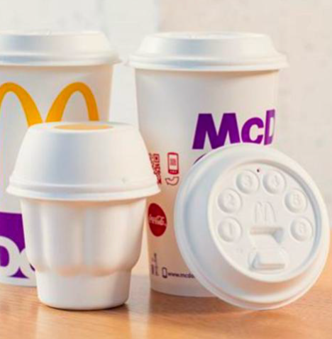 The transition to fiber-based lids is expected to reduce plastic consumption by 59,000 kg by the end of 2025 and lower carbon emissions due to the lids' smaller environmental footprint.