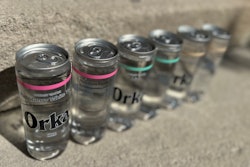 Orka energy drinks are filled in a PET bottle with aluminum closures seamed on, and what appears to be a lightly printed, otherwise transparent pressure-sensitive PE label.