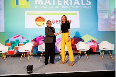 Linda Roman of Kraft Heinz (left) congratulates Sandra Wiegman of Kalpana systems on the Global Innovation Challenge win for 2025.