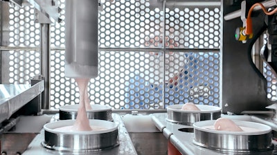 TCCA's family-size filling line fills cartons at about one per second.