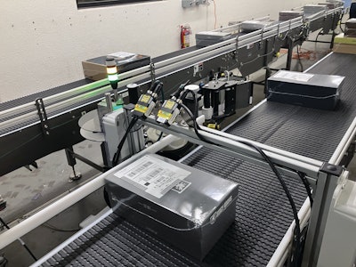 Downstream from the labelers, labels are scanned to make sure the correct label has been applied.