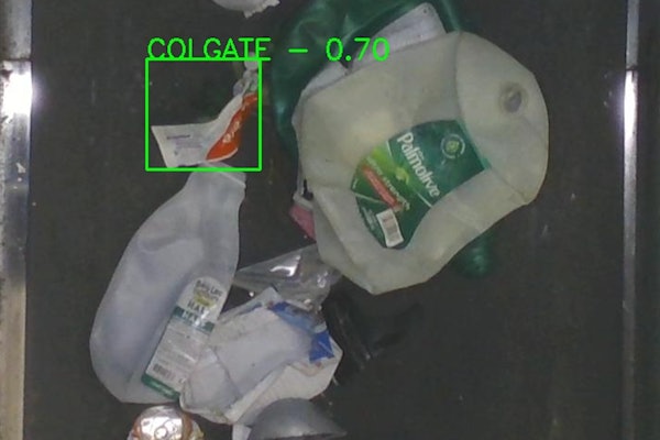 Glacier’s AI system identifies a Colgate toothpaste tube on a Material Recovery Facility (MRF) conveyor line. The system uses optical and material recognition to distinguish HDPE tubes from other plastics, verifying how often they are captured in the recycling stream.