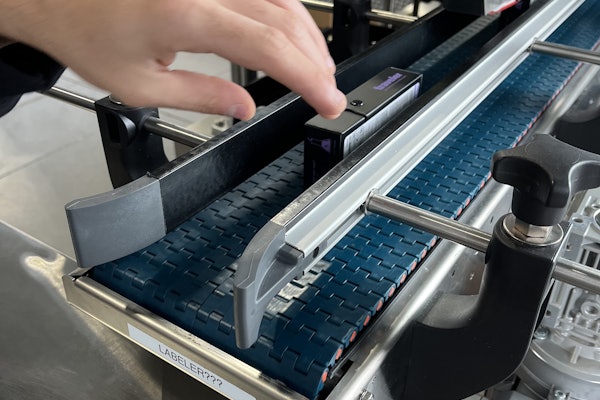 Fernway’s Paxiom dual-head labeler applies regulatory and branding labels to opposite sides of premium cartons at up to 40 per minute.