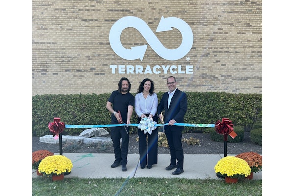 (l. to r.) Tom Szaky and Jen Eichorst of TerraCycle and Aurora, Ill., Mayor John Laesch cut the ribbon at the grand opening of TerraCycle’s new North American Operations Center in Aurora.