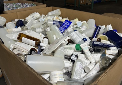 During the grand opening, TerraCycle operators were sorting through beauty product packaging to ensure the shipments included no contaminants that could damage a reprocessor’s equipment.