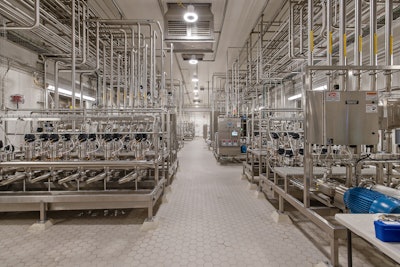 The fluid processing lines utilize double-seat valves with integrated control tops, allowing simultaneous product flow and cleaning in adjacent lines without cross-contamination risk.