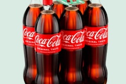 Instead of shrink film, the bottles are held together using strategically placed adhesive dots, paired with a recyclable cardboard handle for carrying.