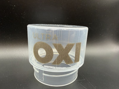 Logo and branding on a recently emptied cap.