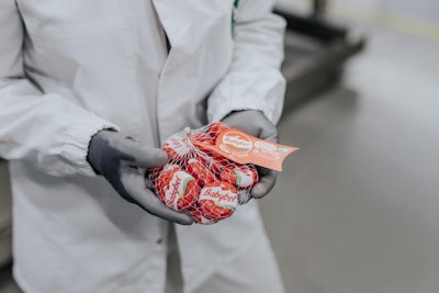 A finished net of Mini Babybel showcases the new paper wrap, engineered to maintain the brand’s iconic experience.