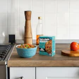 Born Simple’s Terriyaki Chicken Bowl is packaged in a six-layer Tetra Pak retortable carton: four polypropylene layers, one aluminum barrier, and paperboard making up nearly 70% of the structure.