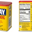 Old Bay Seasoning in tin: McCormick’s Old Bay returns to its classic printed tin canister—iconic blue-and-yellow graphics with a red lid—shown here with front panel and back label (nutrition facts/recipes).