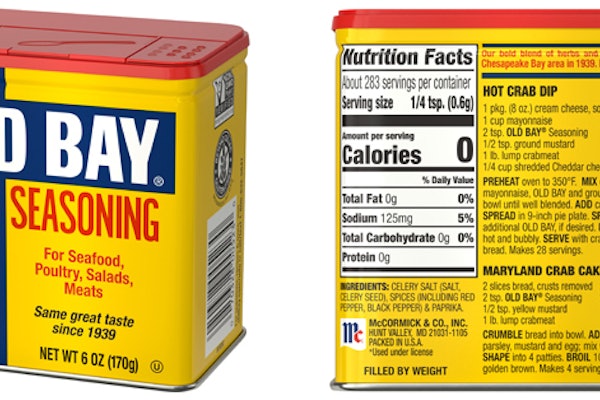 Old Bay Seasoning in tin: McCormick’s Old Bay returns to its classic printed tin canister—iconic blue-and-yellow graphics with a red lid—shown here with front panel and back label (nutrition facts/recipes).